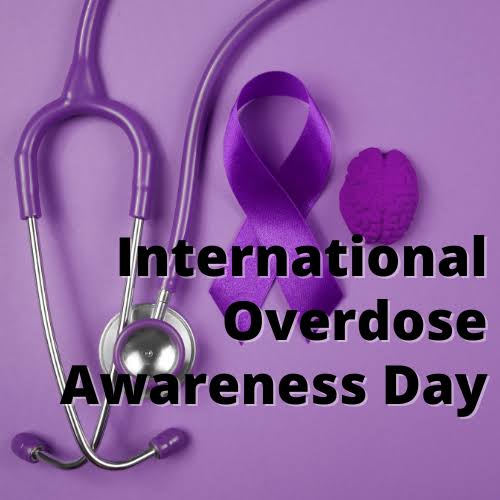 International Overdose Awareness Day – purple ribbon, stethoscope, and brain model